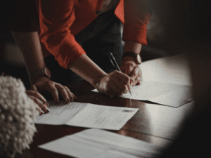 An investor signing a hard money loan application