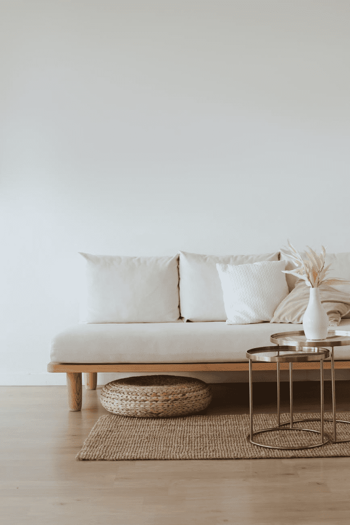 white couch on a wooden floor