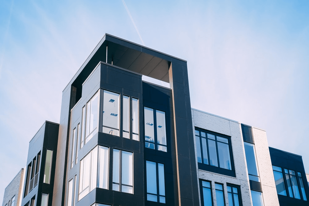 A view of the multifamily property with glass windows