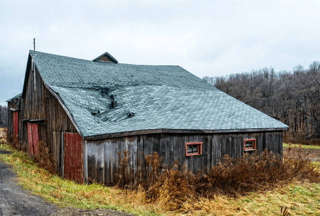 A house with a damaged roof