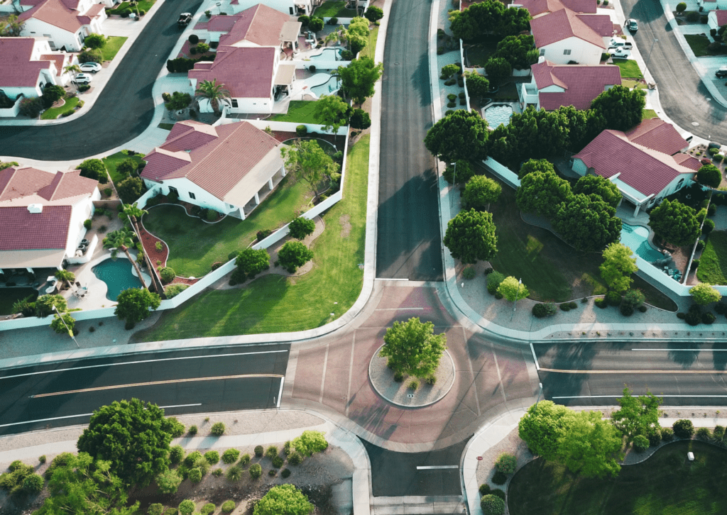 A photo showing an overhead view of homes in a neighborhood.