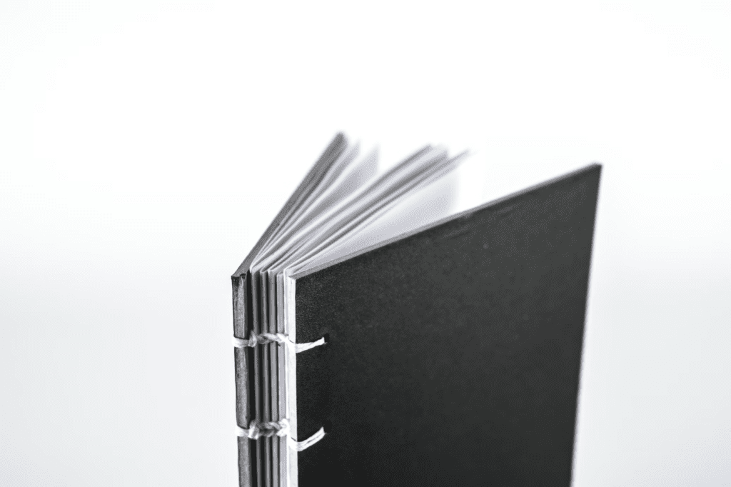 A photo showing a black folder.