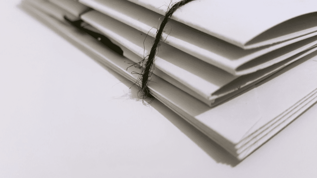 A photo showing a black string around folders.