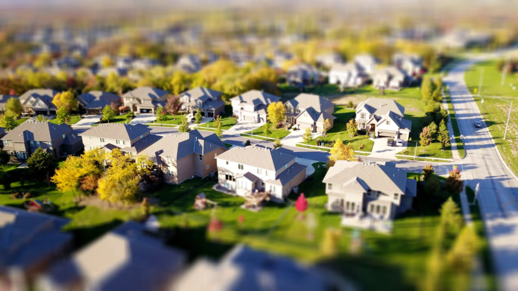 A photo showing homes in a suburban neighborhood.