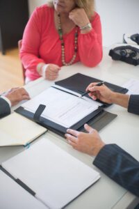 Two people discussing new construction loan terms