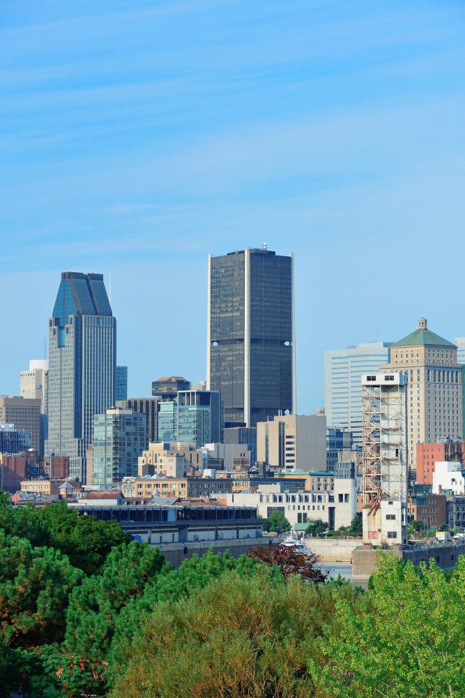 Montreal skyline with prominent skyscrapers on a clear day.