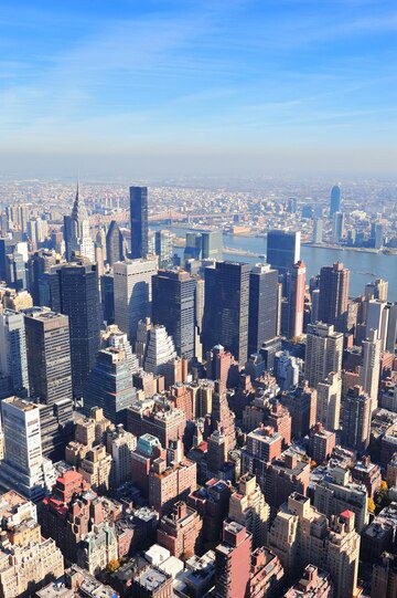 Aerial view of a dense urban skyline on a clear day.