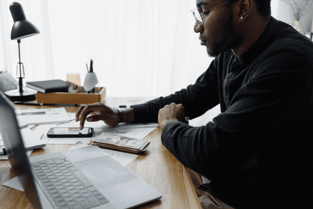 A hard money loan agent working on his laptop