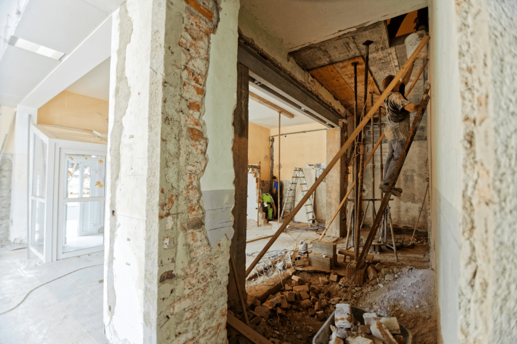 Workers completing a home renovation project.