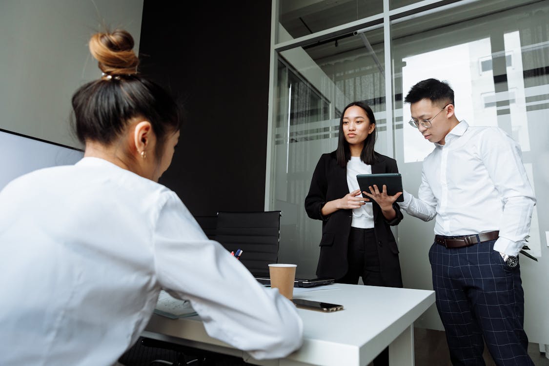 Construction team consulting with a loan agent