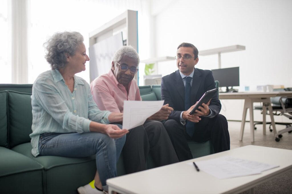 Clients discussing construction loan with loan agent