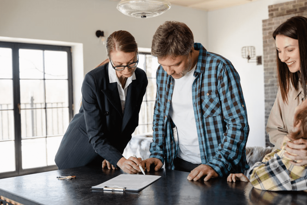 A real estate agent showing a document