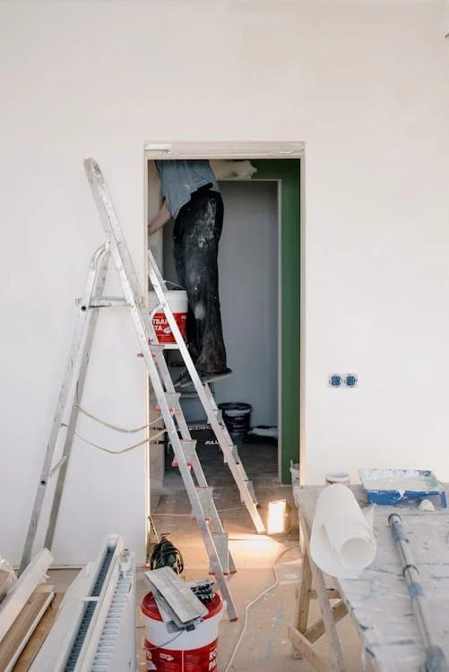 a person painting a property