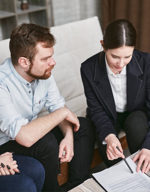 Client and lender reviewing private money loan paperwork