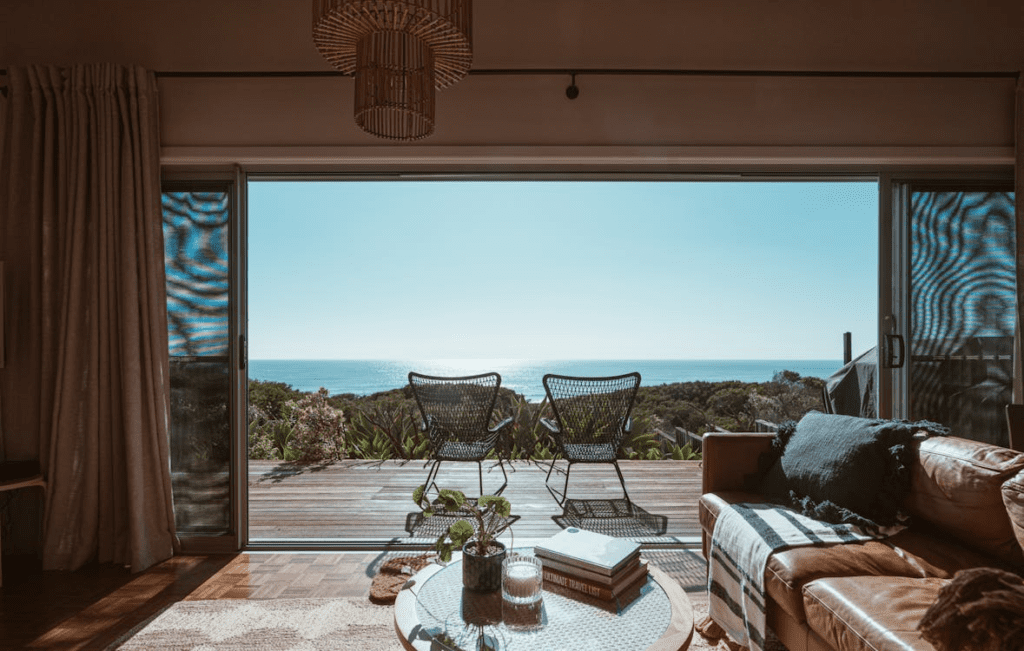 A terrace of a modern vacation property overlooking the ocean