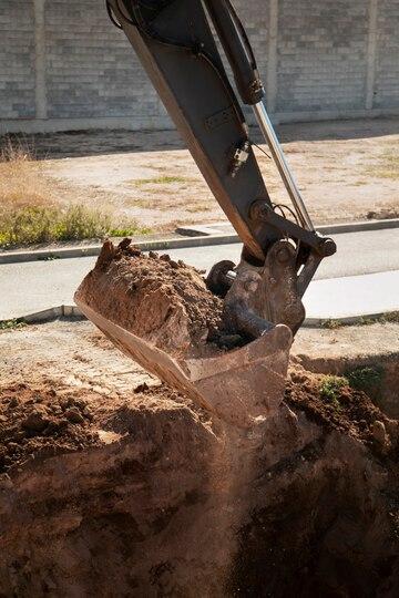 Heavy excavator digging in daylight