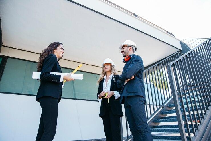 Team of architects discussing construction plans