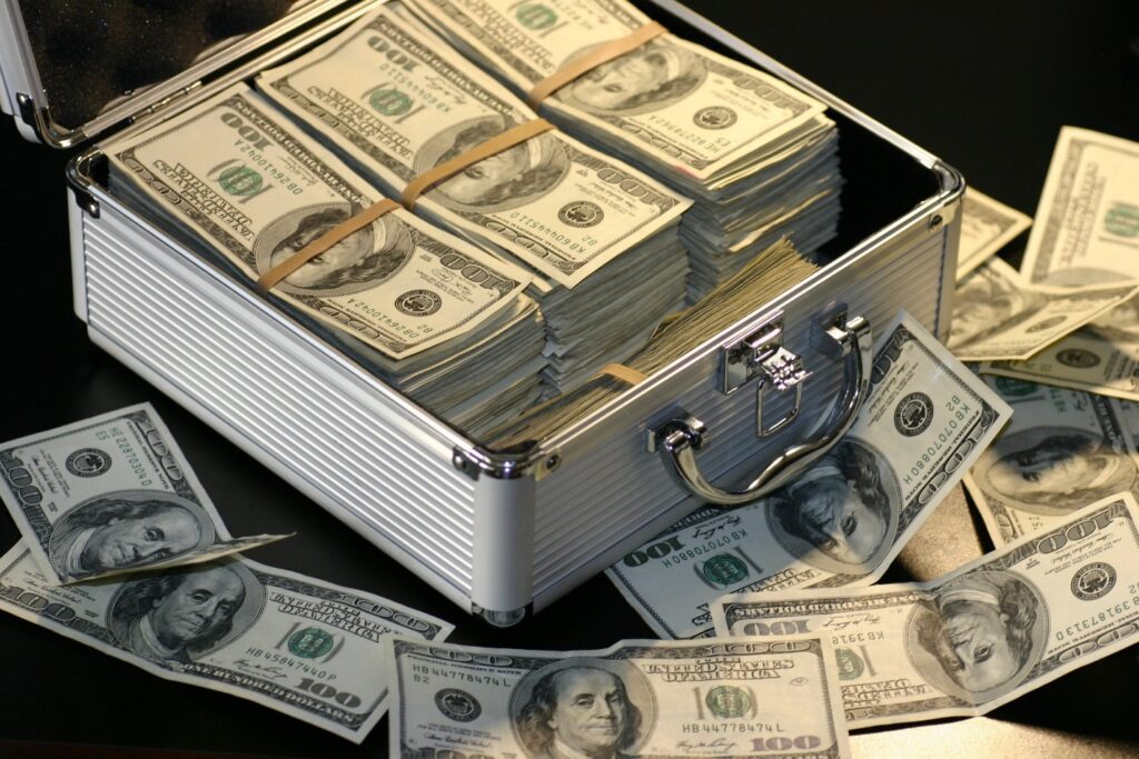 Dollar Bills In a Metal Case