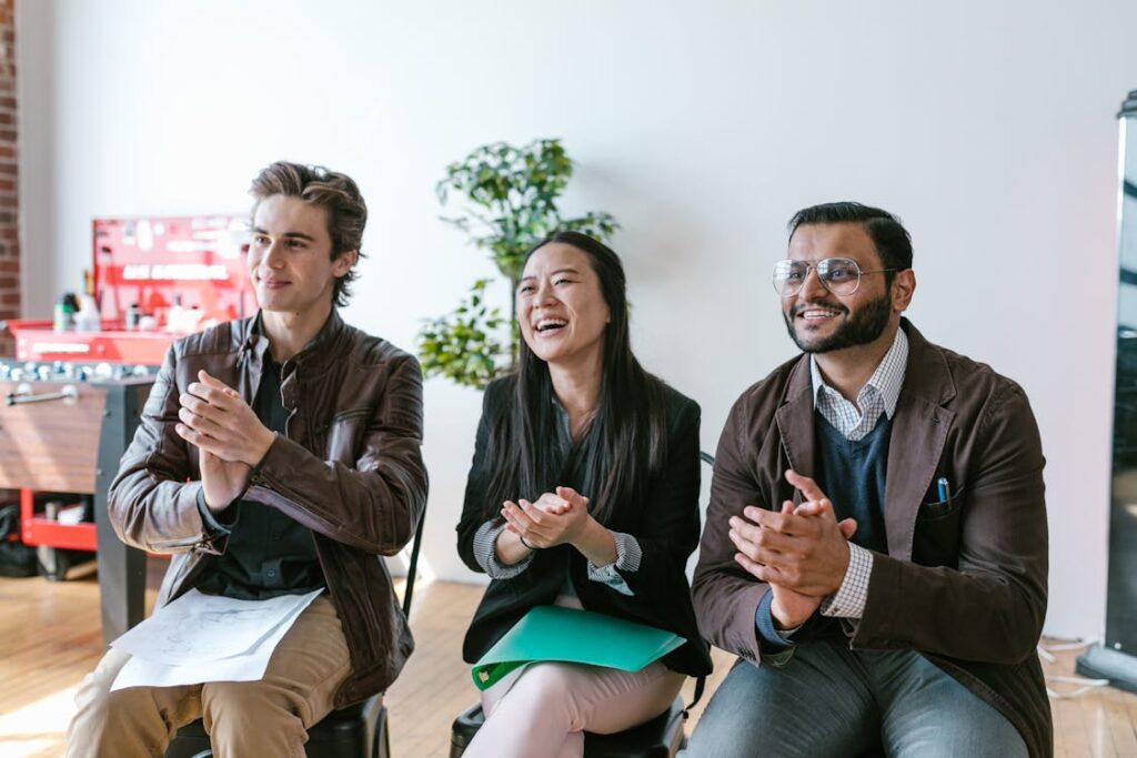 Three people deciding which project to invest in