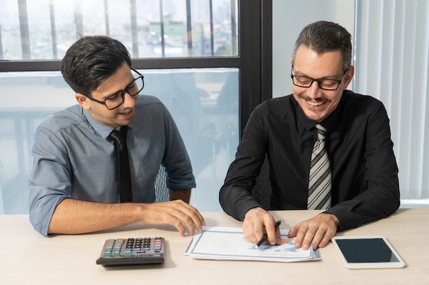 A loan expert helping a man with single-family rental papers