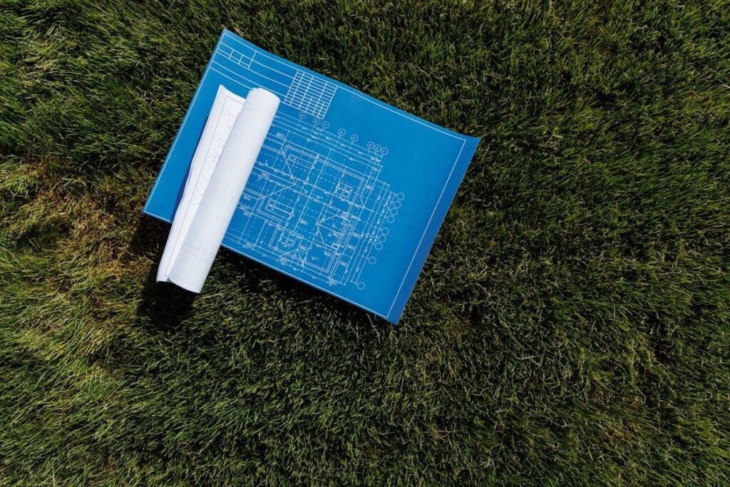 Blueprint on grass