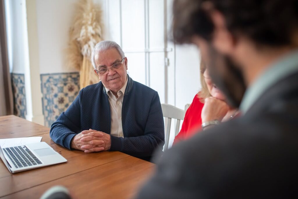 Clients consulting with an accountant, symbolizing financial planning and strategies for real estate investments.