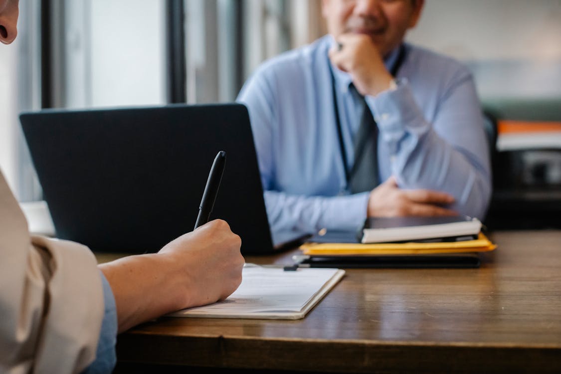 A person signing a contract