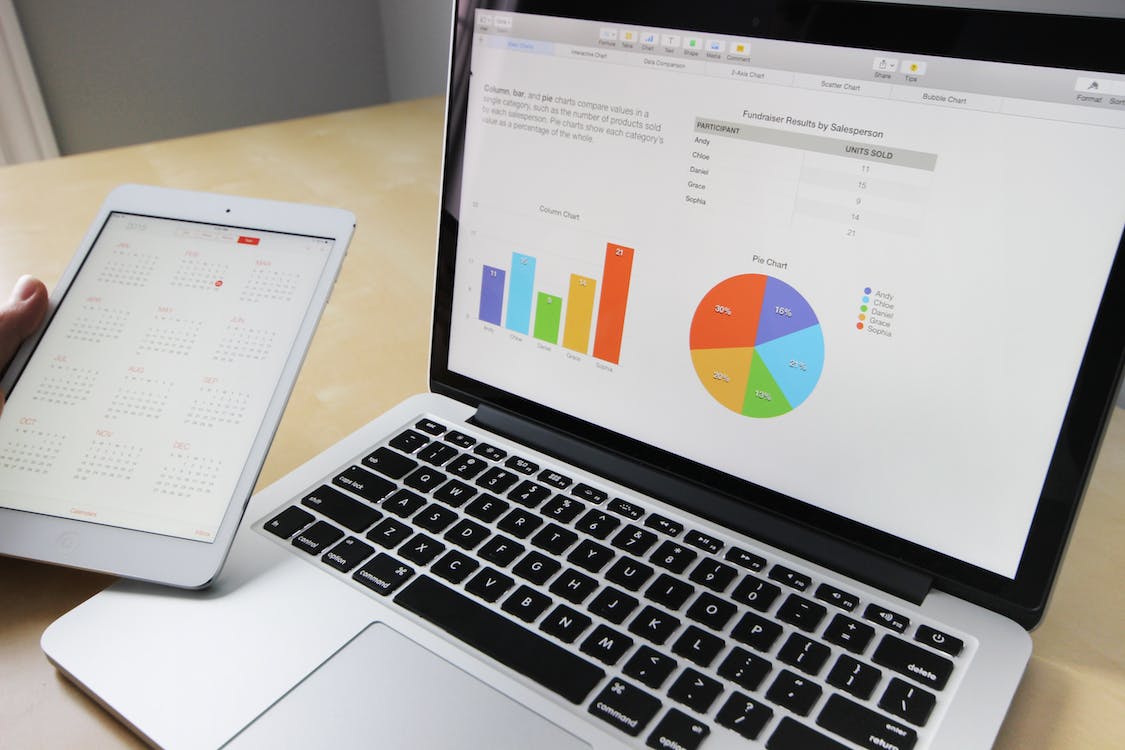 A Laptop Showing investment property financing data 