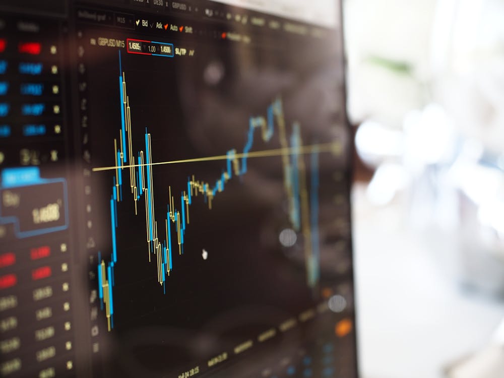 A close-up of a monitor displaying interest rates, symbolizing financial decisions for loans.