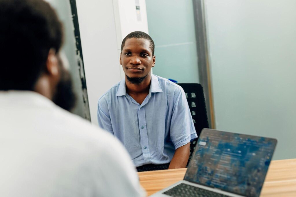 Investor and lender in a meeting discussing financing terms.