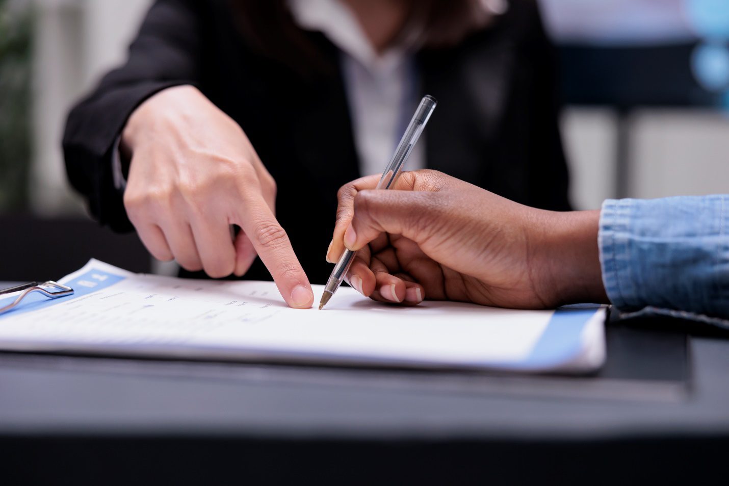  A person signing some documents