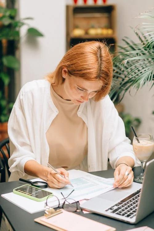A person filling out an online loan application form.