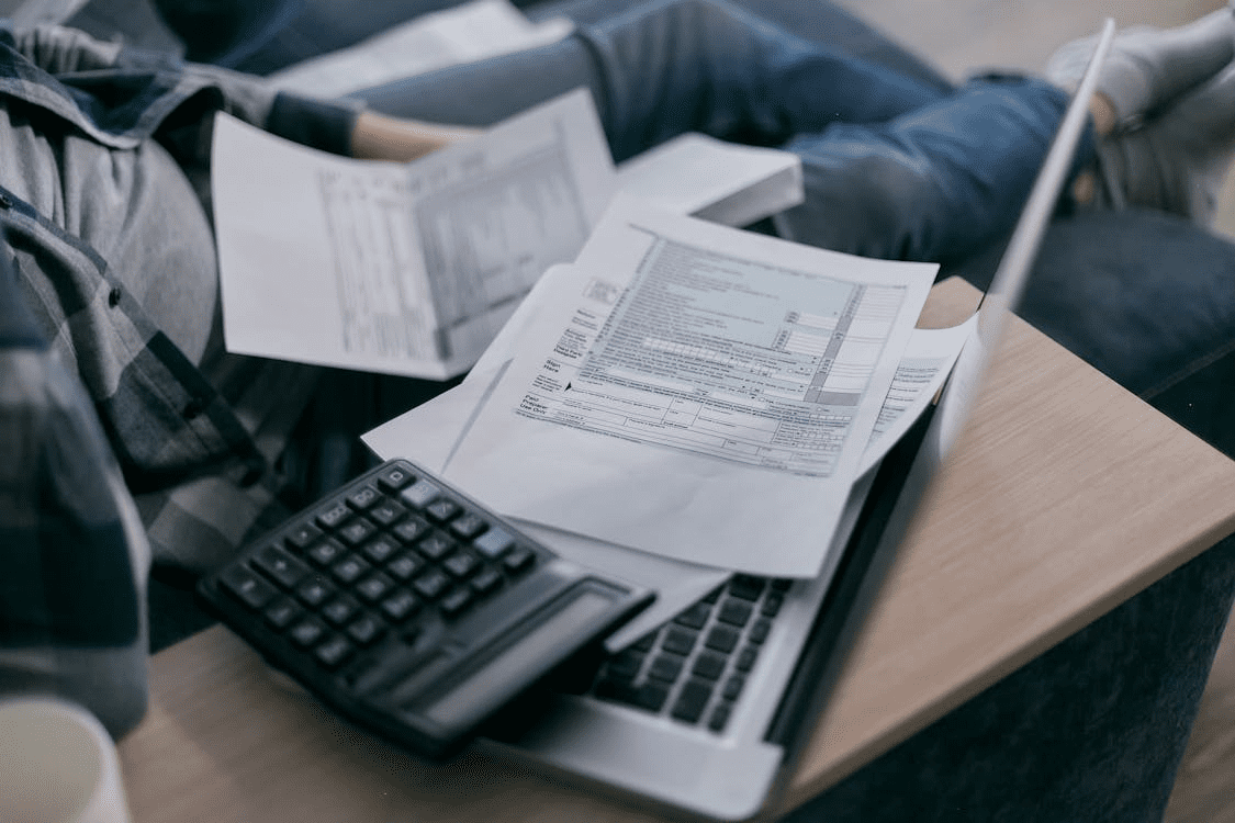 Cropped photo of a person reviewing documents