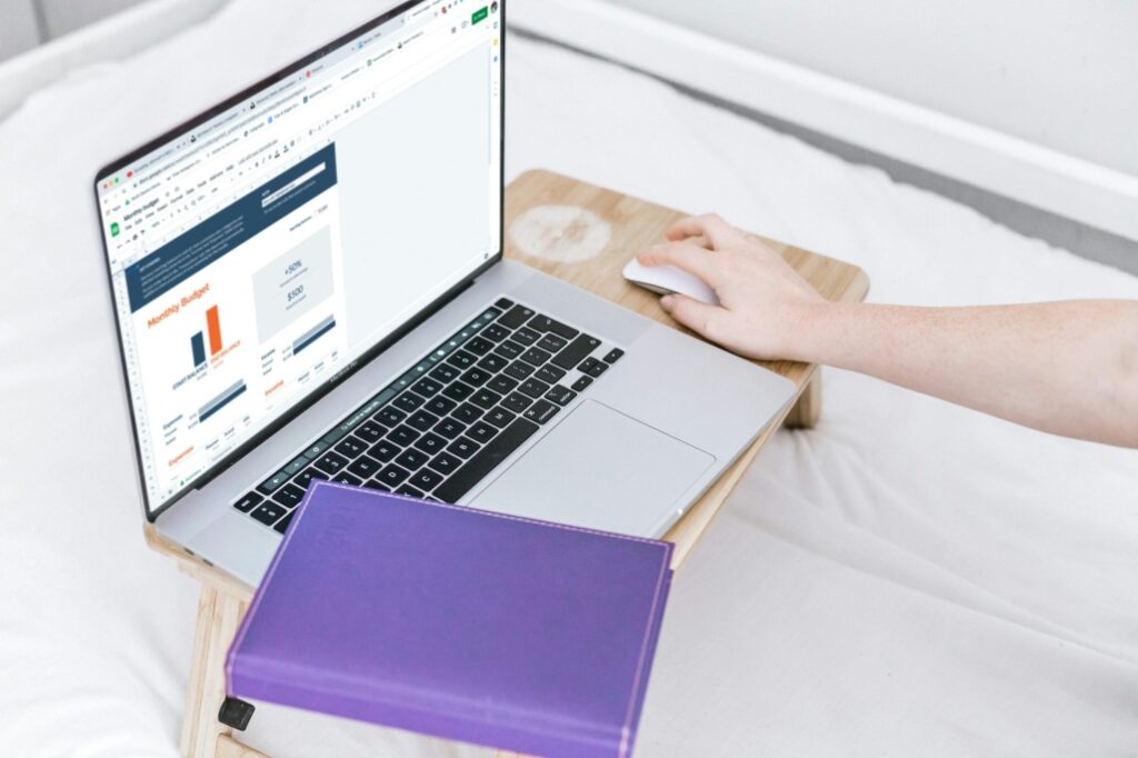 An image of a person using a laptop