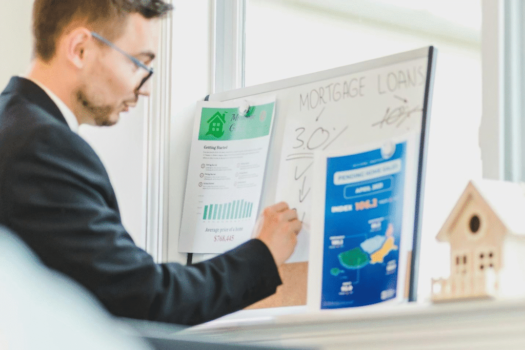 A picture of a person writing on a whiteboard