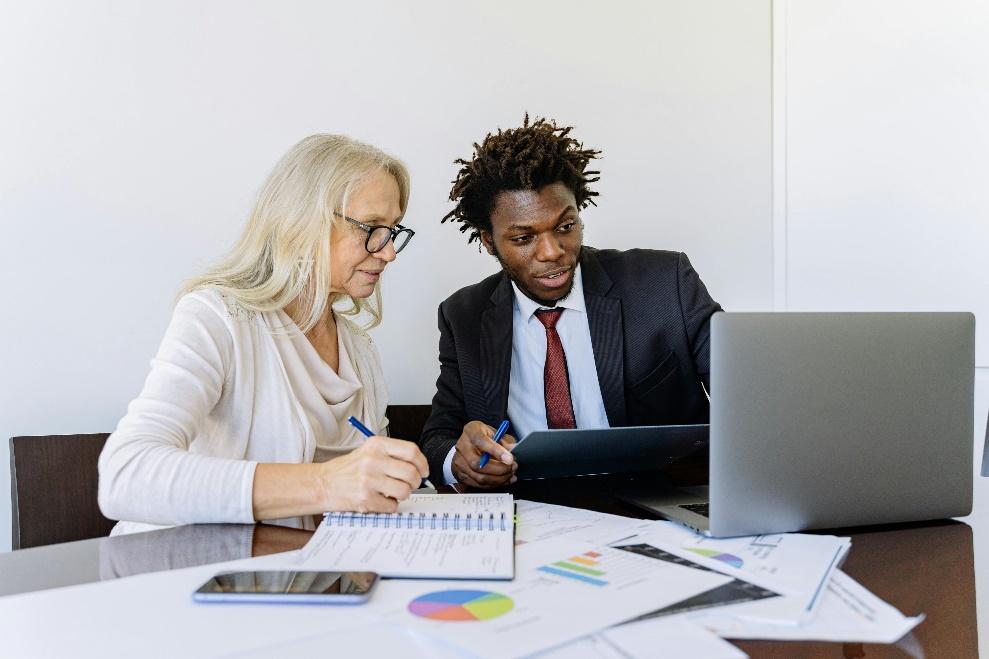 Investor reviewing plans and financial details for a manufactured housing project