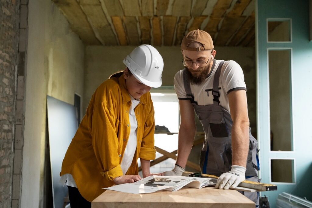 two professional workers focusing on a document