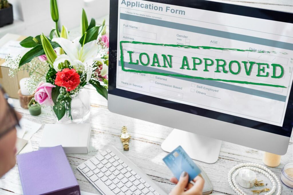 a PC open to display an approved loan application form