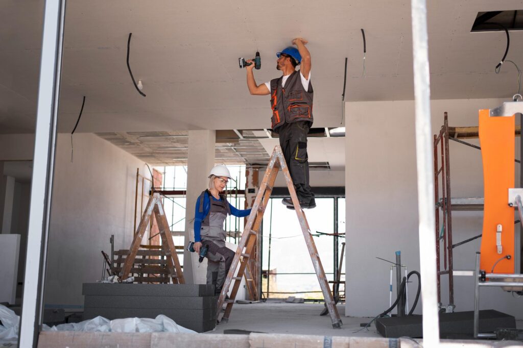 a view of professional renovators working on a property