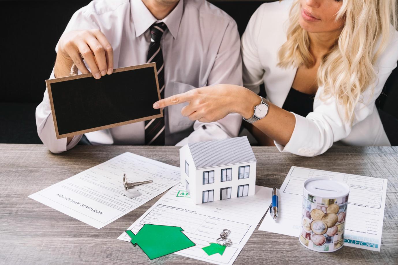 investment property loan lenders amidst a business discussion