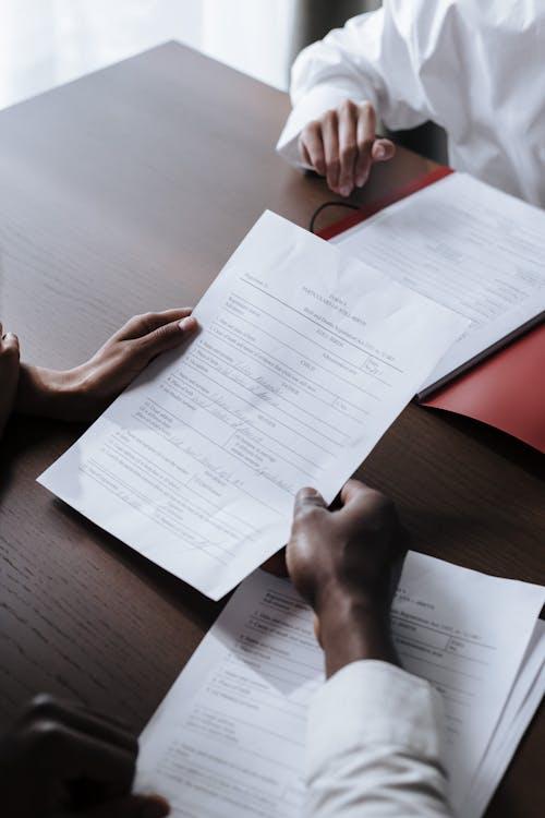 an individual reading a financial document