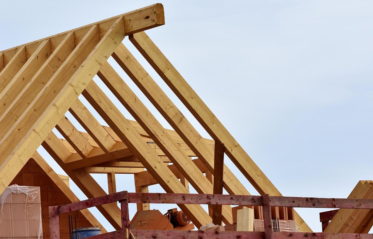 Home in framing stage financed by a new construction loan for first-time builders
