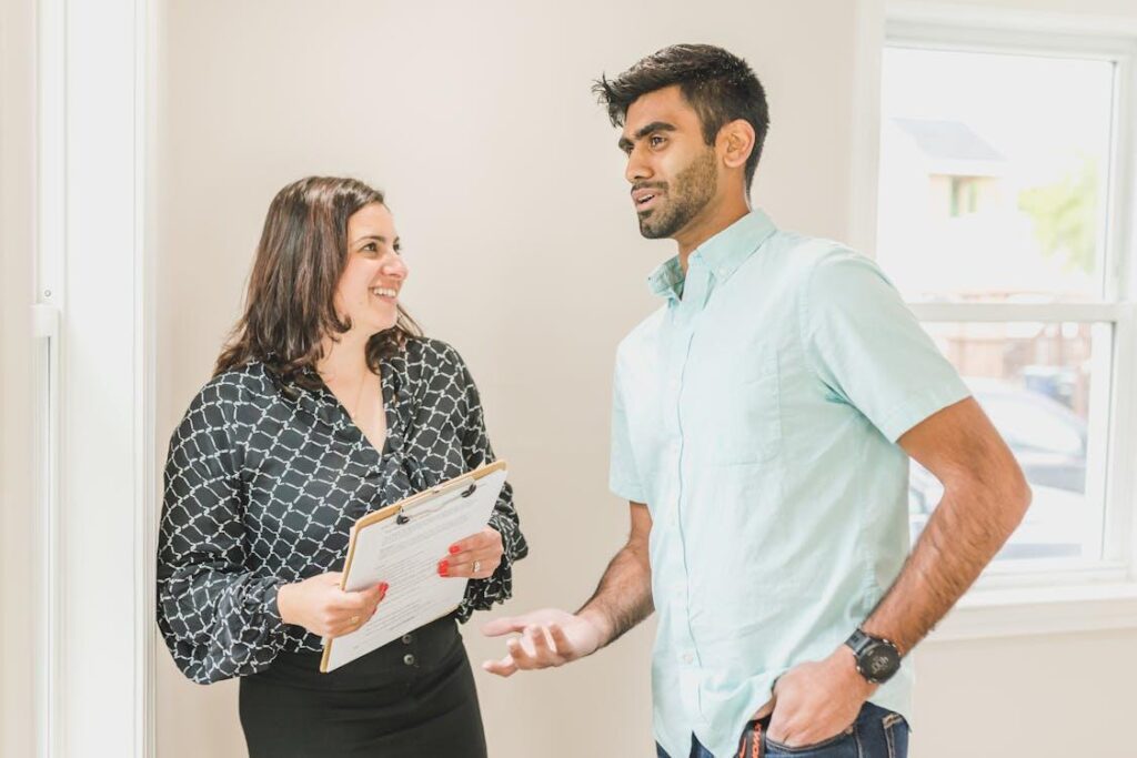 First-time builders meeting with construction loan expert to discuss financing options