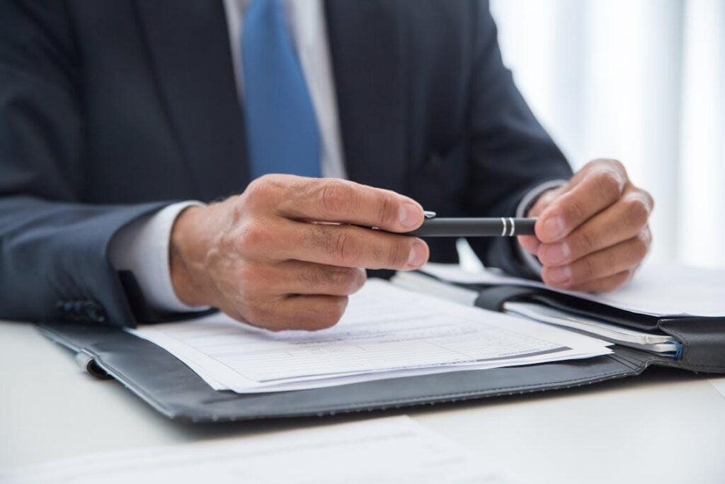 Borrower ready to sign loan documents for new construction loan financing
