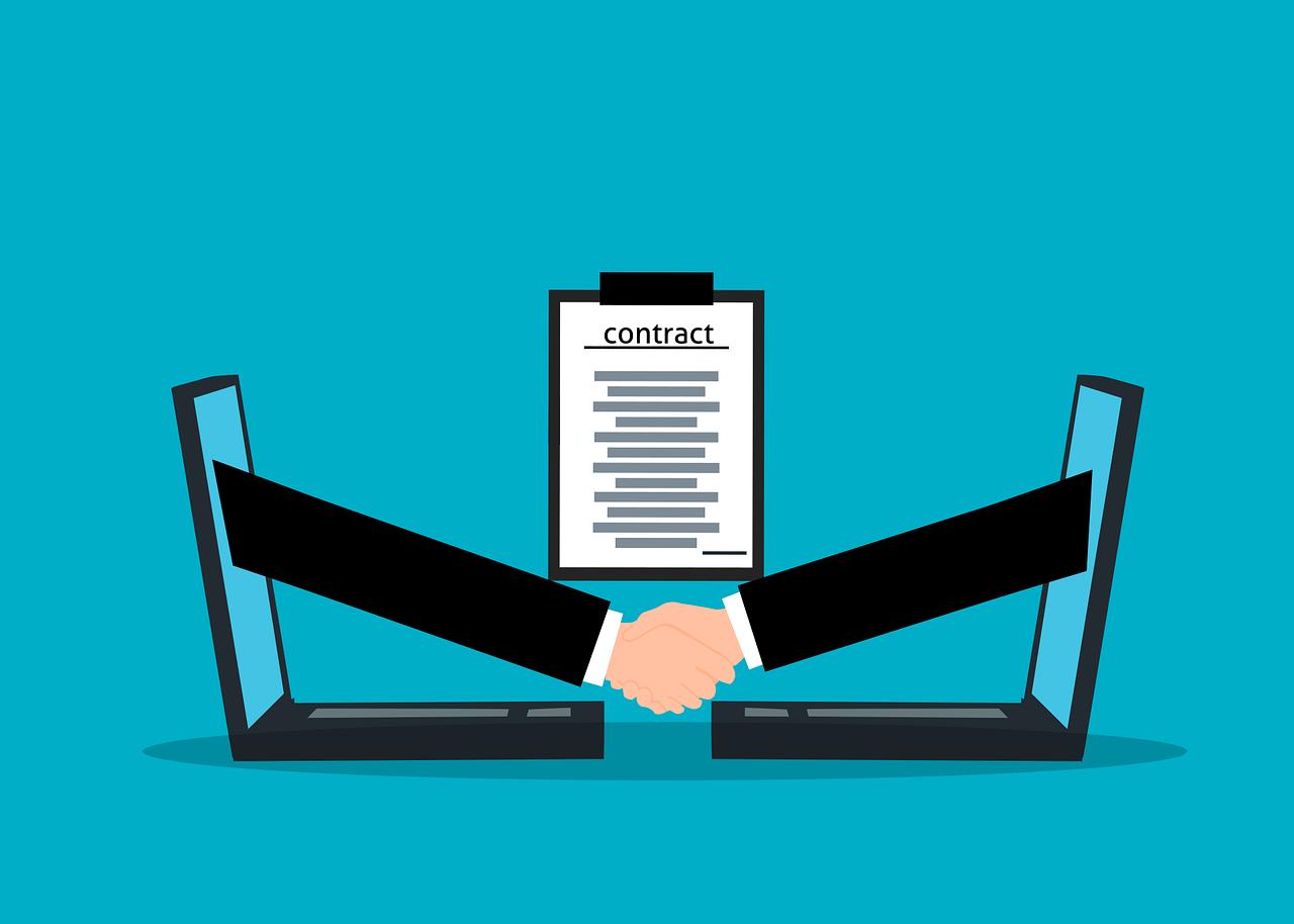 Illustration of two hands emerging from computer screens in a handshake and a contract behind them