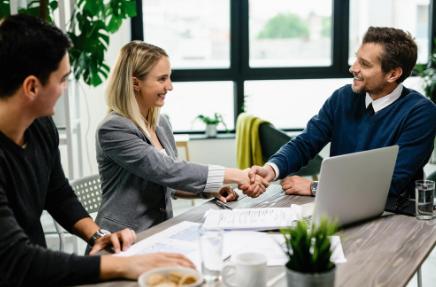 A young couple meets with a lender