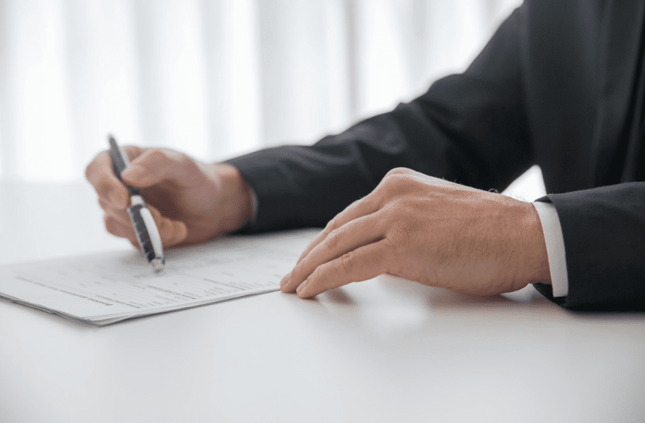 A person filling out a cash out refinance application in Texas.