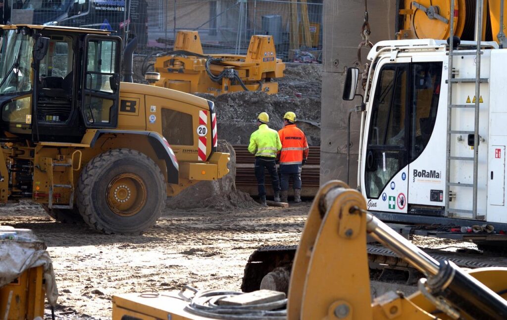 two engineers working at a construction site