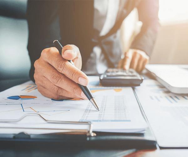 A person working with a pen