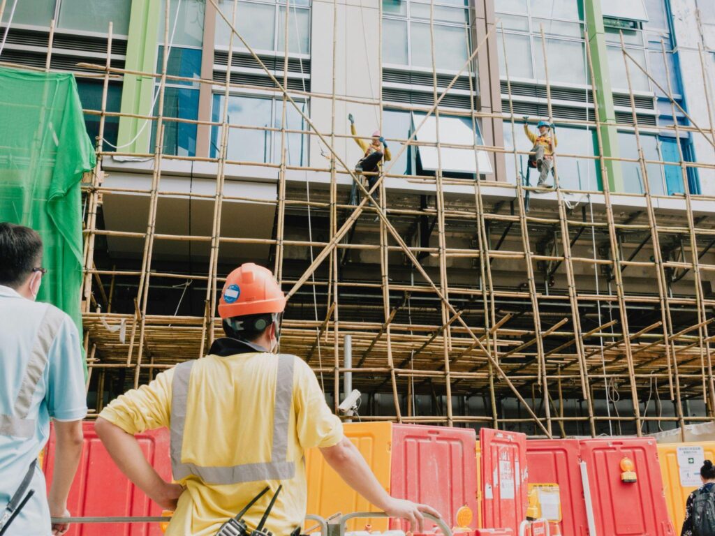 construction workers at work on a building project
